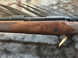 FREE SAFARI, NEW WINCHESTER MODEL 70 SUPER GRADE 300 WIN MAG 26
