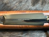 FREE SAFARI, NEW WINCHESTER MODEL 70 SUPER GRADE 300 WIN MAG 26