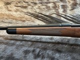 FREE SAFARI, NEW WINCHESTER MODEL 70 SUPER GRADE 300 WIN MAG 26