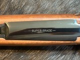 FREE SAFARI, NEW WINCHESTER MODEL 70 SUPER GRADE 338 WIN MAG 26
