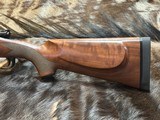 FREE SAFARI, NEW WINCHESTER MODEL 70 SUPER GRADE 338 WIN MAG 26