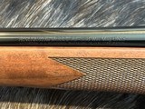FREE SAFARI, NEW WINCHESTER MODEL 70 SUPER GRADE 338 WIN MAG 26