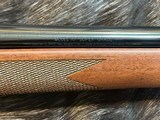 FREE SAFARI, NEW WINCHESTER MODEL 70 SUPER GRADE 338 WIN MAG 26