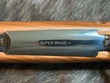FREE SAFARI, NEW WINCHESTER MODEL 70 SUPER GRADE FRENCH WALNUT 300 WIN MAG 26