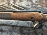 FREE SAFARI, NEW WINCHESTER MODEL 70 SUPER GRADE FRENCH WALNUT 300 WIN MAG 26
