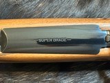 FREE SAFARI, NEW WINCHESTER MODEL 70 SUPER GRADE FRENCH WALNUT 300 WIN MAG 26