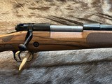 FREE SAFARI, NEW WINCHESTER MODEL 70 SUPER GRADE FRENCH WALNUT 300 WIN MAG 26