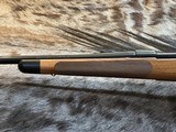 FREE SAFARI, NEW WINCHESTER MODEL 70 SUPER GRADE FRENCH WALNUT 300 WIN MAG 26