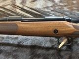 FREE SAFARI, NEW WINCHESTER MODEL 70 SUPER GRADE FRENCH WALNUT 300 WIN MAG 26