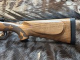 FREE SAFARI, NEW WINCHESTER MODEL 70 SUPER GRADE FRENCH WALNUT 300 WIN MAG 26