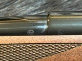 FREE SAFARI, NEW WINCHESTER MODEL 70 SUPER GRADE 338 WIN MAG 26