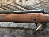 FREE SAFARI, NEW WINCHESTER MODEL 70 SUPER GRADE 338 WIN MAG 26