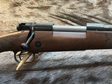NEW WINCHESTER MODEL 70 SUPER GRADE 300 WIN MAG 26