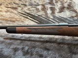 NEW WINCHESTER MODEL 70 SUPER GRADE 300 WIN MAG 26