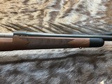 NEW WINCHESTER MODEL 70 SUPER GRADE 300 WIN MAG 26