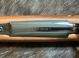 NEW WINCHESTER MODEL 70 SUPER GRADE 300 WIN MAG 26