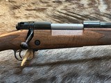 NEW WINCHESTER MODEL 70 SUPER GRADE 300 WIN MAG 26