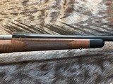 NEW WINCHESTER MODEL 70 SUPER GRADE 300 WIN MAG 26