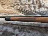 NEW WINCHESTER MODEL 70 SUPER GRADE 300 WIN MAG 26