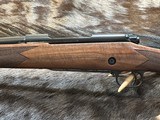 NEW WINCHESTER MODEL 70 SUPER GRADE 300 WIN MAG 26