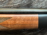NEW WINCHESTER MODEL 70 SUPER GRADE 300 WIN MAG 26