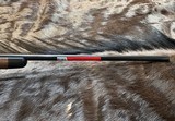 NEW WINCHESTER MODEL 70 SUPER GRADE 300 WIN MAG 26