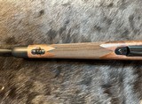 NEW WINCHESTER MODEL 70 SUPER GRADE 300 WIN MAG 26