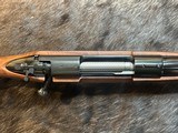 NEW WINCHESTER MODEL 70 SUPER GRADE 300 WIN MAG 26