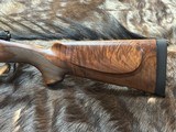 NEW WINCHESTER MODEL 70 SUPER GRADE 300 WIN MAG 26