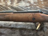 NEW WINCHESTER MODEL 70 SUPER GRADE 300 WIN MAG 26