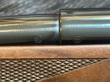 NEW WINCHESTER MODEL 70 SUPER GRADE 300 WIN MAG 26