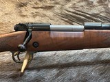 NEW WINCHESTER MODEL 70 SUPER GRADE 300 WIN MAG 26