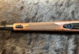 NEW WINCHESTER MODEL 70 SUPER GRADE 300 WIN MAG 26