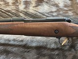 NEW WINCHESTER MODEL 70 SUPER GRADE 300 WIN MAG 26