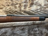 NEW WINCHESTER MODEL 70 SUPER GRADE 300 WIN MAG 26