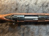 NEW WINCHESTER MODEL 70 SUPER GRADE 300 WIN MAG 26