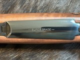 NEW WINCHESTER MODEL 70 SUPER GRADE 300 WIN MAG 26