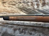 NEW WINCHESTER MODEL 70 SUPER GRADE 300 WIN MAG 26