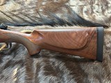 NEW WINCHESTER MODEL 70 SUPER GRADE 300 WIN MAG 26