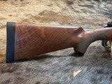 NEW WINCHESTER MODEL 70 SUPER GRADE 300 WIN MAG 26