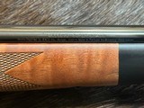NEW WINCHESTER MODEL 70 SUPER GRADE 300 WIN MAG 26