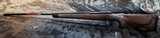 NEW WINCHESTER MODEL 70 SUPER GRADE 300 WIN MAG 26