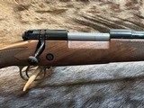 NEW WINCHESTER MODEL 70 SUPER GRADE 300 WIN MAG 26