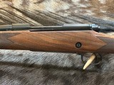 NEW WINCHESTER MODEL 70 SUPER GRADE 300 WIN MAG 26