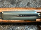 NEW WINCHESTER MODEL 70 SUPER GRADE 300 WIN MAG 26
