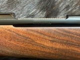 NEW WINCHESTER MODEL 70 SUPER GRADE 300 WIN MAG 26