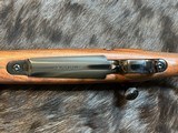 NEW WINCHESTER MODEL 70 SUPER GRADE 300 WIN MAG 26