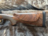 NEW WINCHESTER MODEL 70 SUPER GRADE 300 WIN MAG 26