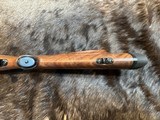 NEW WINCHESTER MODEL 70 SUPER GRADE 300 WIN MAG 26