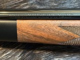 NEW WINCHESTER MODEL 70 SUPER GRADE 300 WIN MAG 26